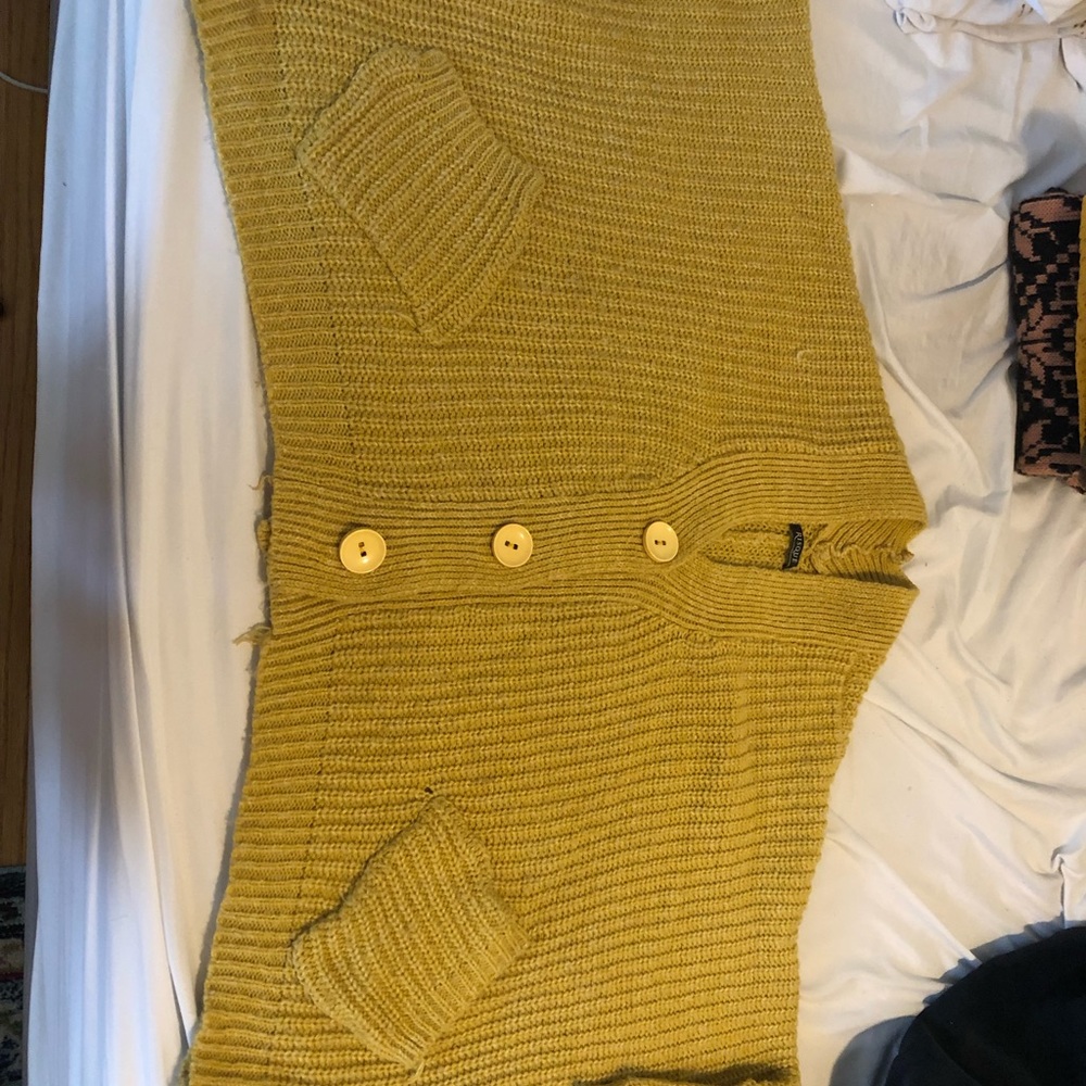 Extra wide mustard sweater. Super soft and cozy. Worn extremely baggy.
